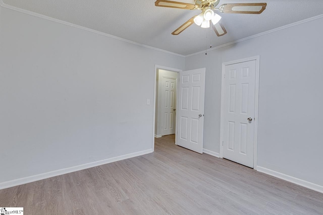 1709 Lyndon Ave, Anderson, SC 29624 - unfurnished bedroom featuring wood finished floors, baseboards, crown molding, a ceiling fan, and a textured ceiling