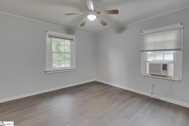 1709 Lyndon Ave, Anderson, SC 29624 - unfurnished room featuring wood finished floors, baseboards, a ceiling fan, ornamental molding, and cooling unit