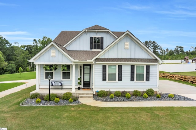 226 Deerview Trl, Simpsonville, SC 29680 - modern farmhouse with a shingled roof, covered porch, board and batten siding, and a front yard
