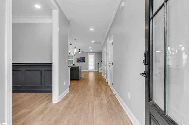 226 Deerview Trl, Simpsonville, SC 29680 - corridor featuring crown molding, light wood-style floors, a chandelier, and recessed lighting
