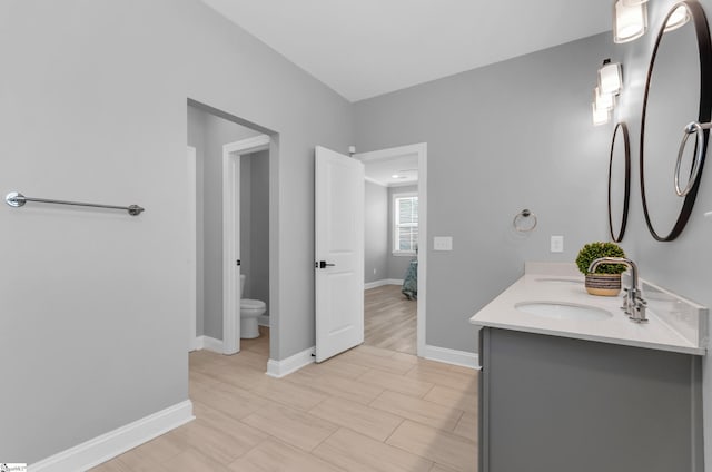 226 Deerview Trl, Simpsonville, SC 29680 - bathroom featuring baseboards, toilet, and double vanity