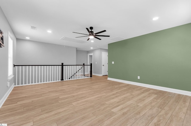 226 Deerview Trl, Simpsonville, SC 29680 - spare room featuring attic access, a ceiling fan, light wood-style flooring, baseboards, and recessed lighting