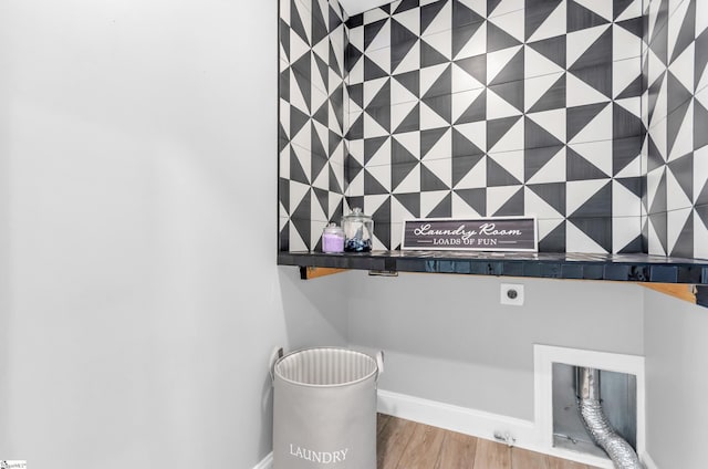 226 Deerview Trl, Simpsonville, SC 29680 - washroom featuring electric dryer hookup, baseboards, and wood finished floors