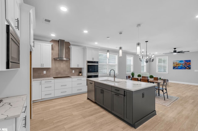 226 Deerview Trl, Simpsonville, SC 29680 - kitchen featuring wall chimney exhaust hood, a sink, stainless steel appliances, white cabinets, and recessed lighting