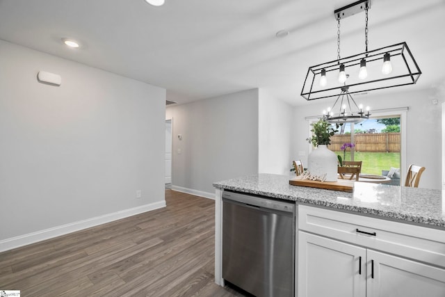 2606 Karkinnen Way, Moore, SC 29369 - kitchen featuring dishwasher, a chandelier, dark wood finished floors, baseboards, and light stone countertops