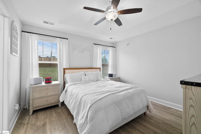 2606 Karkinnen Way, Moore, SC 29369 - bedroom with light wood-type flooring, baseboards, and a ceiling fan
