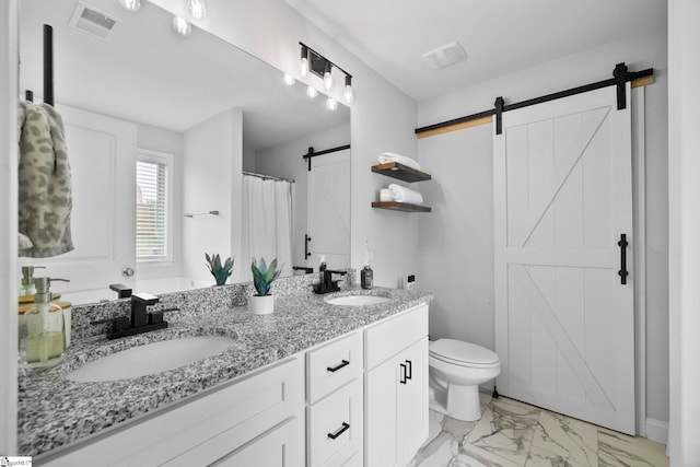 2606 Karkinnen Way, Moore, SC 29369 - full bath featuring marble look tile flooring, double vanity, toilet, and curtained shower