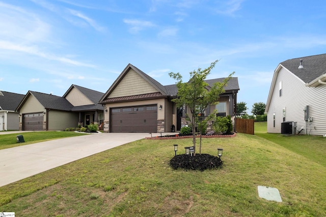 2606 Karkinnen Way, Moore, SC 29369 - view of front facade with driveway, a garage, cooling unit, and a standing seam roof