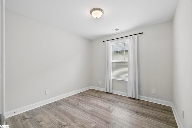 2606 Karkinnen Way, Moore, SC 29369 - spare room with wood finished floors and baseboards
