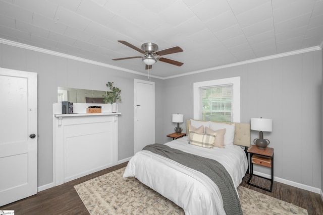 1818 Green St, Anderson, SC 29625 - bedroom with crown molding, dark wood finished floors, baseboards, and a ceiling fan
