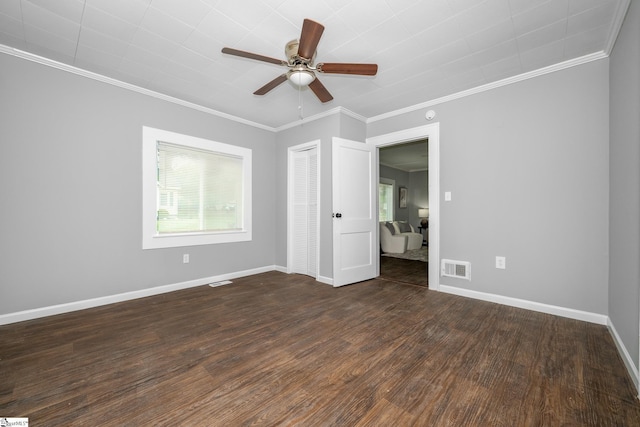 1818 Green St, Anderson, SC 29625 - empty room with dark wood-style floors, ornamental molding, ceiling fan, and baseboards