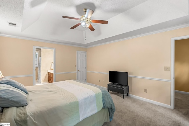 103 Farming Creek Dr, Simpsonville, SC 29680 - carpeted bedroom with a raised ceiling, crown molding, ensuite bathroom, a ceiling fan, and a textured ceiling