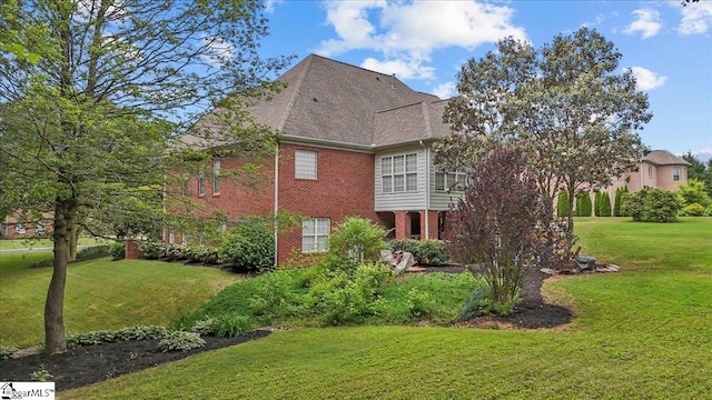 449 Crepe Myrtle Dr, Greer, SC 29651 - view of side of property with brick siding, a lawn, and roof with shingles