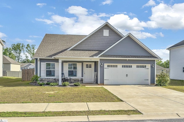 116 Bruinen Dr, Fountain Inn, SC 29644 - view of front of house with an attached garage, covered porch, driveway, and a shingled roof