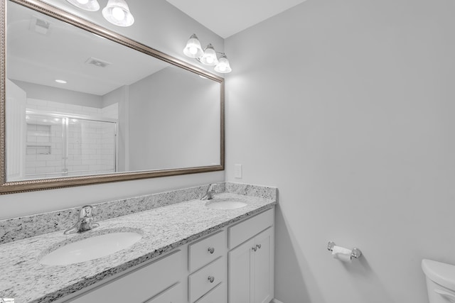 116 Bruinen Dr, Fountain Inn, SC 29644 - full bathroom with a stall shower, double vanity, and toilet