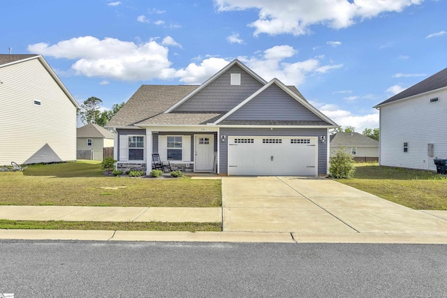 116 Bruinen Dr, Fountain Inn, SC 29644 - craftsman-style house featuring a front lawn, an attached garage, covered porch, and concrete driveway