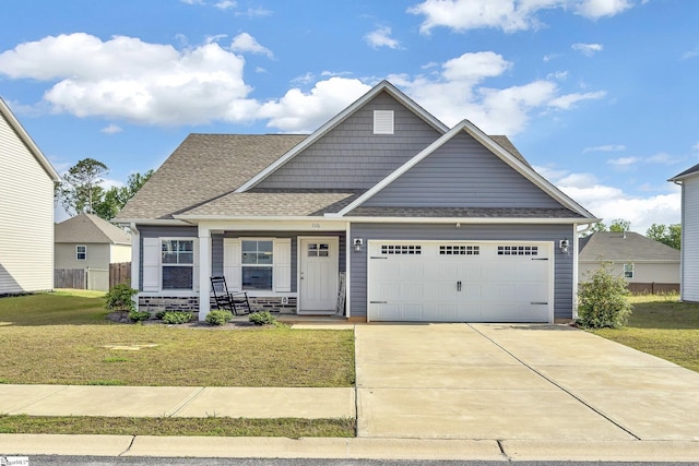 116 Bruinen Dr, Fountain Inn, SC 29644 - view of front of home featuring covered porch, a garage, a front yard, driveway, and a shingled roof