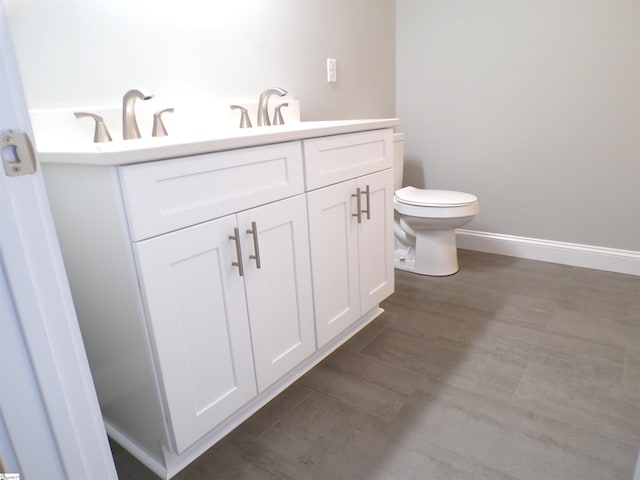 291 Robbins Rd, Chesnee, SC 29323 - bathroom featuring toilet, baseboards, and vanity