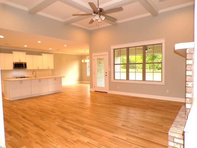 291 Robbins Rd, Chesnee, SC 29323 - unfurnished living room with a chandelier, recessed lighting, beamed ceiling, light wood-type flooring, and ceiling fan