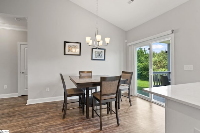 723 Mile Creek Rd, Pickens, SC 29671 - dining area with wood finished floors, a chandelier, baseboards, high vaulted ceiling, and ornamental molding