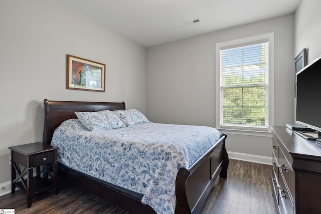 723 Mile Creek Rd, Pickens, SC 29671 - bedroom featuring dark wood finished floors, baseboards, and multiple windows