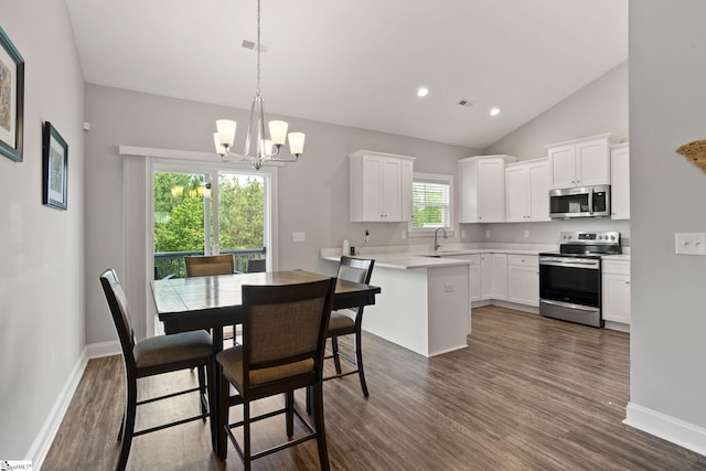 723 Mile Creek Rd, Pickens, SC 29671 - dining area featuring dark wood finished floors, a chandelier, vaulted ceiling, baseboards, and recessed lighting