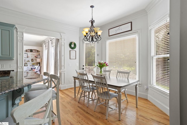 1 Riverstone Way, Greer, SC 29651 - dining space with a chandelier, light wood finished floors, ornamental molding, and baseboards