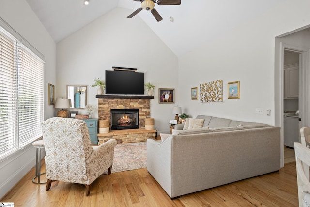 1 Riverstone Way, Greer, SC 29651 - living room featuring high vaulted ceiling, a fireplace, a ceiling fan, and wood finished floors