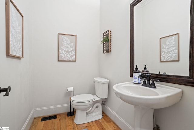 1 Riverstone Way, Greer, SC 29651 - half bath featuring baseboards, wood finished floors, and toilet
