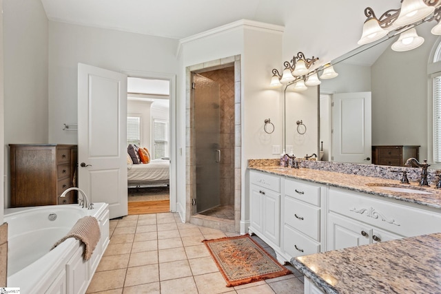 1 Riverstone Way, Greer, SC 29651 - ensuite bathroom featuring double vanity, a stall shower, a garden tub, and tile patterned floors