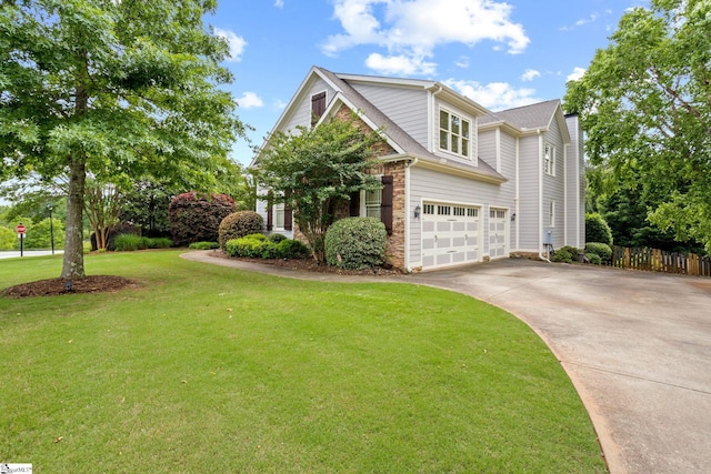 1 Riverstone Way, Greer, SC 29651 - view of front facade featuring driveway, an attached garage, a chimney, and stone siding
