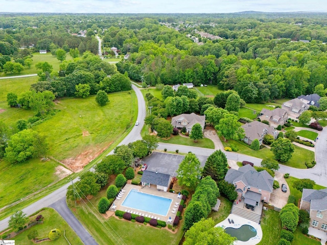 1 Riverstone Way, Greer, SC 29651 - aerial view of residential area featuring a pool and a heavily wooded area