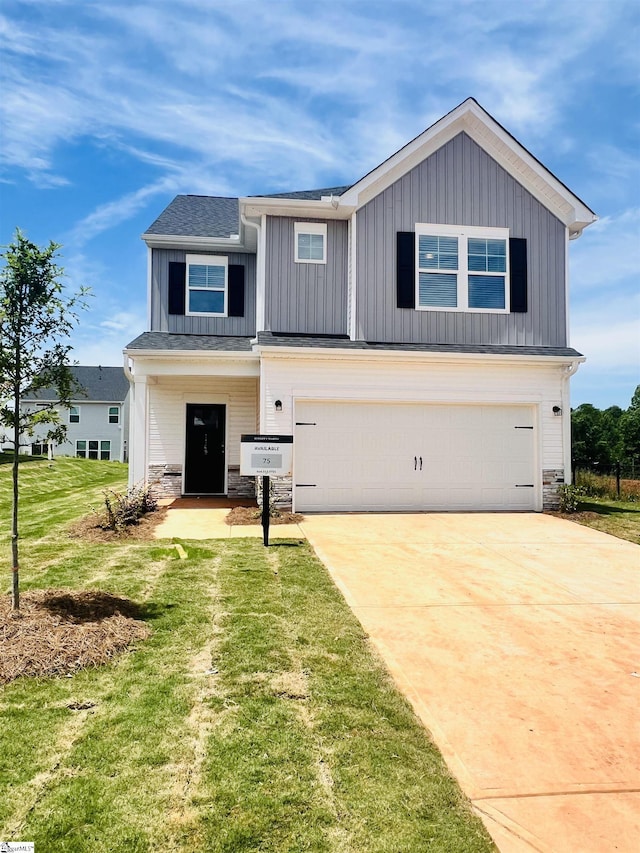 1149 Berry Patch Dr, Lyman, SC 29365 - view of front facade featuring an attached garage, board and batten siding, stone siding, and concrete driveway