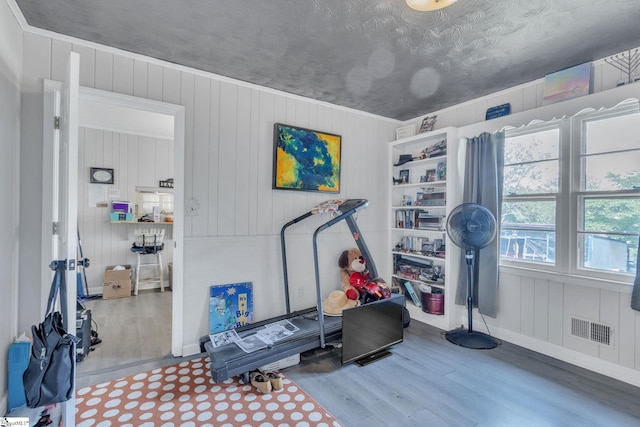 273 Cedar Springs Rd, Spartanburg, SC 29302 - exercise room with wood finished floors and baseboards