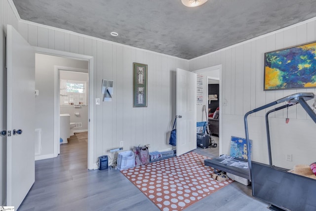 273 Cedar Springs Rd, Spartanburg, SC 29302 - workout area featuring wood finished floors, baseboards, and wood walls