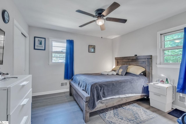 273 Cedar Springs Rd, Spartanburg, SC 29302 - bedroom with wood finished floors, baseboards, and ceiling fan