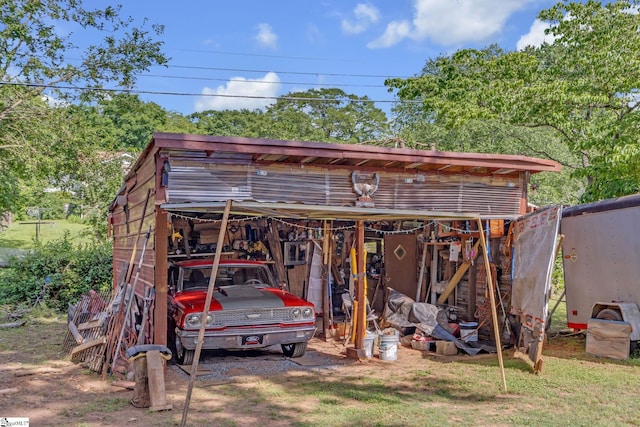 273 Cedar Springs Rd, Spartanburg, SC 29302 - view of outbuilding with a carport
