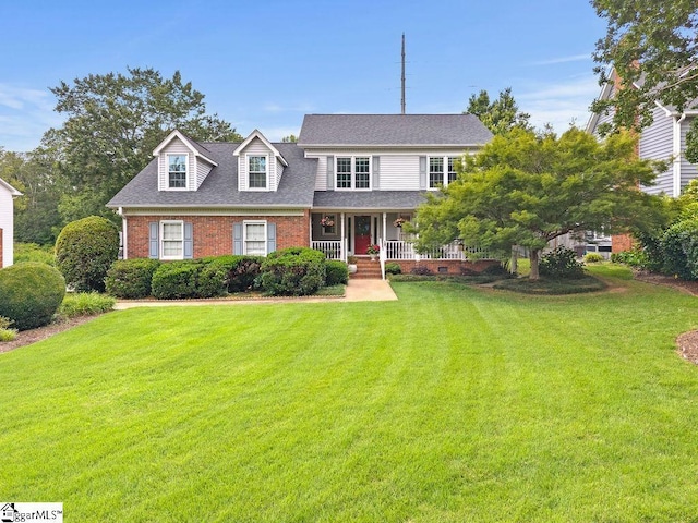 3 Staten Ln, Taylors, SC 29687 - view of front of property with a porch, brick siding, a front lawn, and a shingled roof