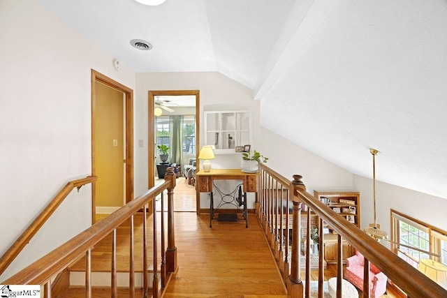 3 Staten Ln, Taylors, SC 29687 - corridor with an upstairs landing, lofted ceiling, and light wood-style floors