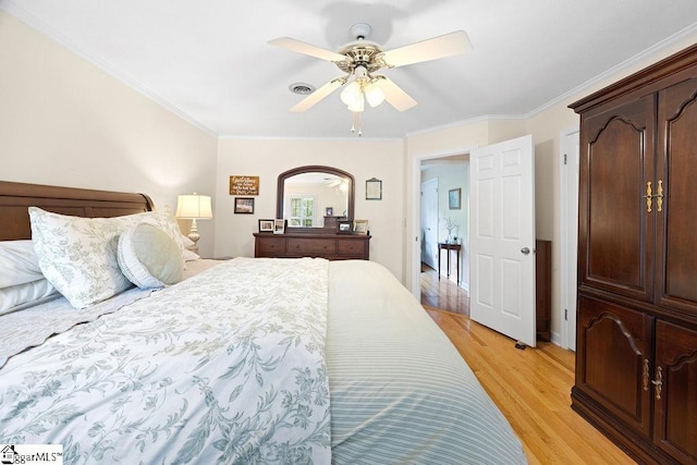 3 Staten Ln, Taylors, SC 29687 - bedroom with light wood-style floors, ornamental molding, and a ceiling fan