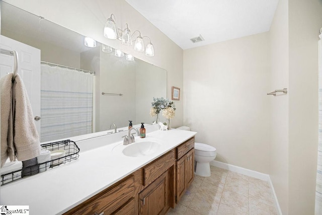 3 Staten Ln, Taylors, SC 29687 - bathroom featuring vanity, toilet, baseboards, and tile patterned floors