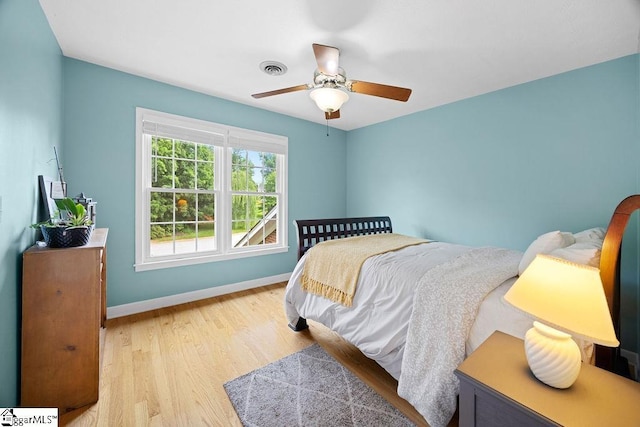 3 Staten Ln, Taylors, SC 29687 - bedroom with baseboards, light wood-type flooring, and ceiling fan