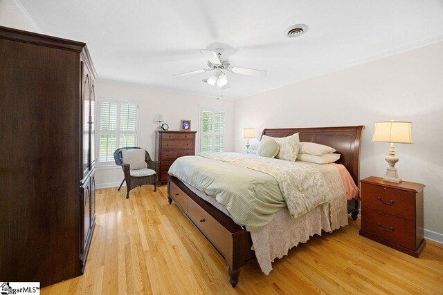 3 Staten Ln, Taylors, SC 29687 - bedroom featuring light wood-style floors, baseboards, crown molding, and a ceiling fan