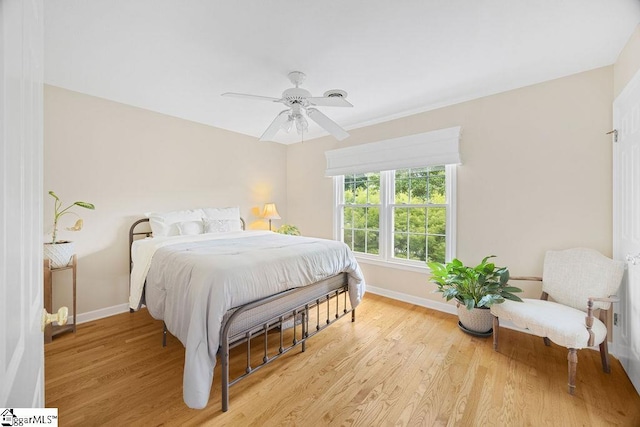 3 Staten Ln, Taylors, SC 29687 - bedroom with baseboards, light wood finished floors, and ceiling fan
