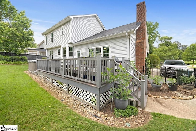 3 Staten Ln, Taylors, SC 29687 - back of property with a chimney and a deck