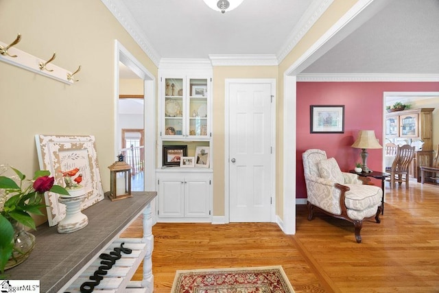 3 Staten Ln, Taylors, SC 29687 - foyer with light wood finished floors, ornamental molding, and baseboards