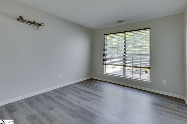 349 Hamilton Pkwy, Easley, SC 29642 - spare room featuring dark wood-type flooring and baseboards