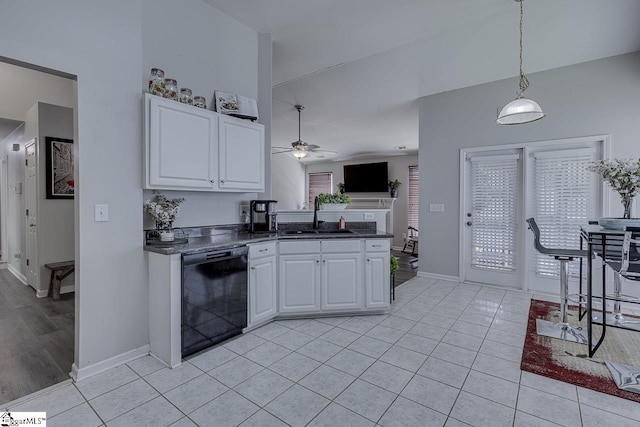 349 Hamilton Pkwy, Easley, SC 29642 - kitchen with black dishwasher, a sink, a ceiling fan, white cabinets, and baseboards