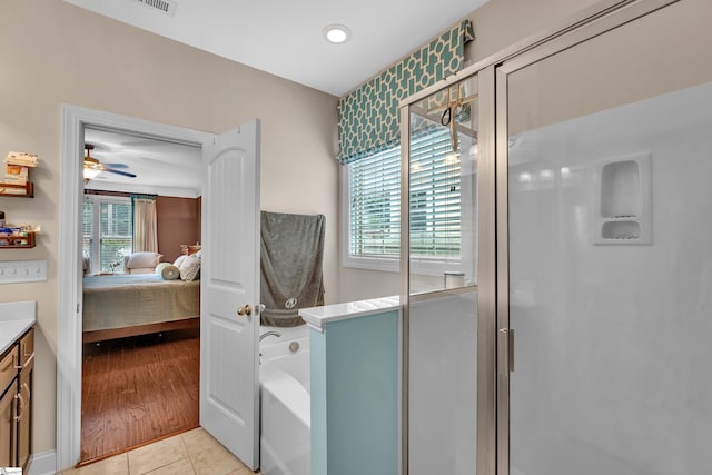 201 Wiscasset Way, Greenville, SC 29615 - full bathroom featuring ensuite bath, a garden tub, vanity, a stall shower, and ceiling fan