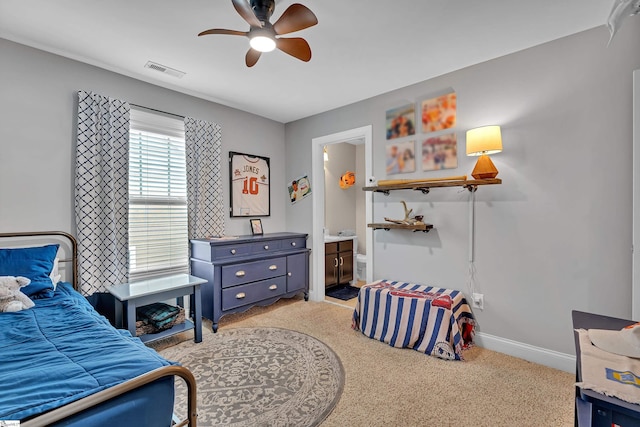 201 Wiscasset Way, Greenville, SC 29615 - bedroom with light carpet, baseboards, ensuite bath, and ceiling fan